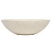 Bílé kulaté terrazzo umyvadlo na desku Kave Home Delina 40 cm