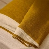 Žluto-bílý vlněý pléd Kave Home Orlet 170 x 130 cm -fv-interier-25